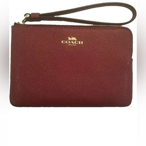 CORNER ZIP WRISTLET. NEW WITH TAG original box